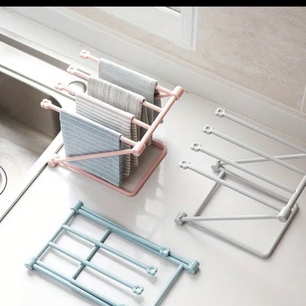 NWOT light pink towel dryer for small towels only, dimensions included